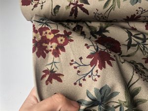 Fastvævet twill med stræk - mørk sand med natur tema